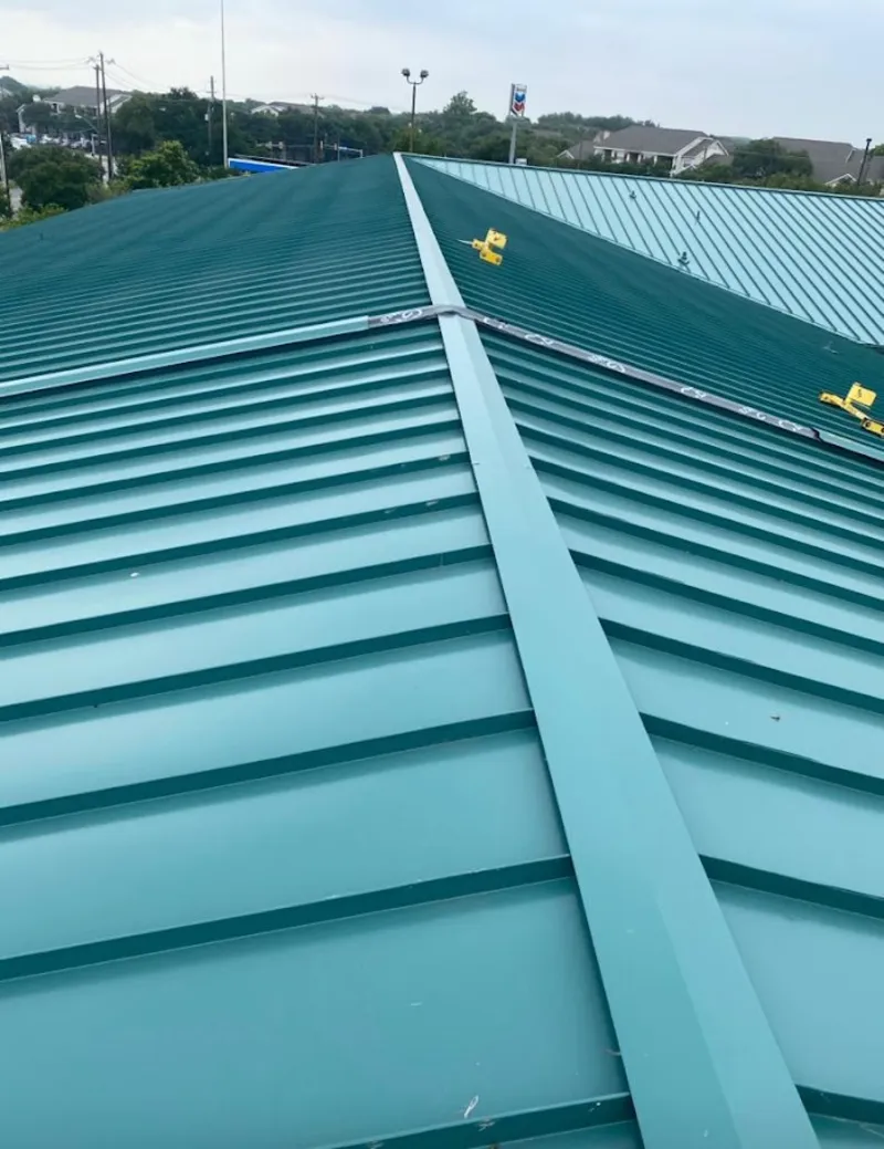 Green commercial metal roof ridge and valley for Metal Roof Repair in Sinton